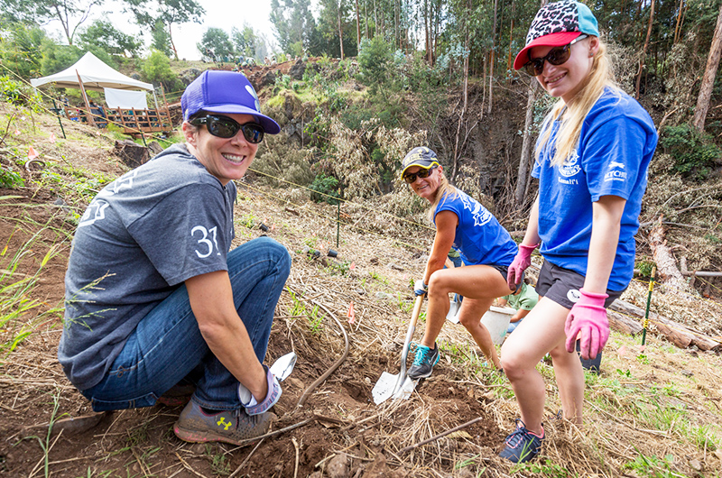 Skyline Eco-Adventures planting trees on a volunteer day