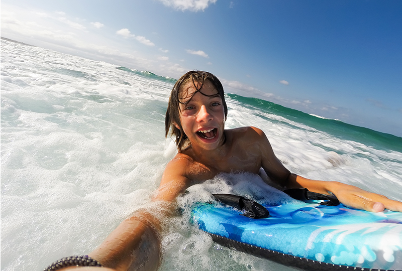 Take surfing lessons with your kids on Maui